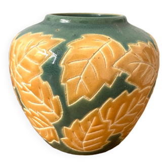 Green and ceramic yellow floral motif vase
