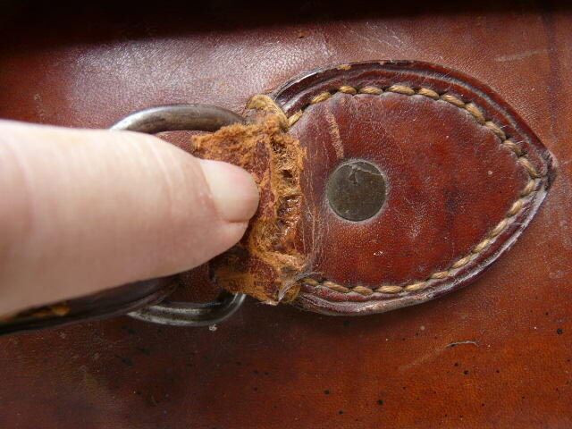 Old monogrammed leather travel suitcase and barony crown