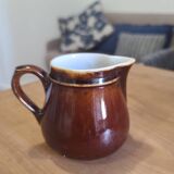 Brown ceramic milk jug