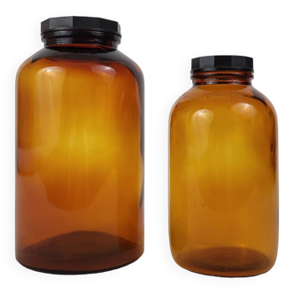 2 pots à pharmacie en verre ambré / bakélite