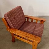 Old vintage Scandinavian design pine armchair from the 70s