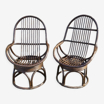 Pair of vintage rattan swivel chairs