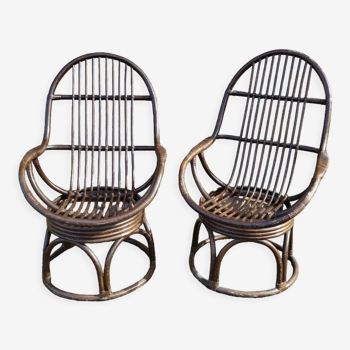 Paire de fauteuils pivotants en rotin vintage