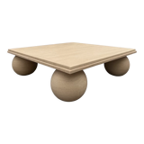 Table basse carrée en pierre avec pieds de balle sculpturaux