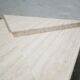 Series of 2 vintage travertine coffee tables published by Roche Bobois