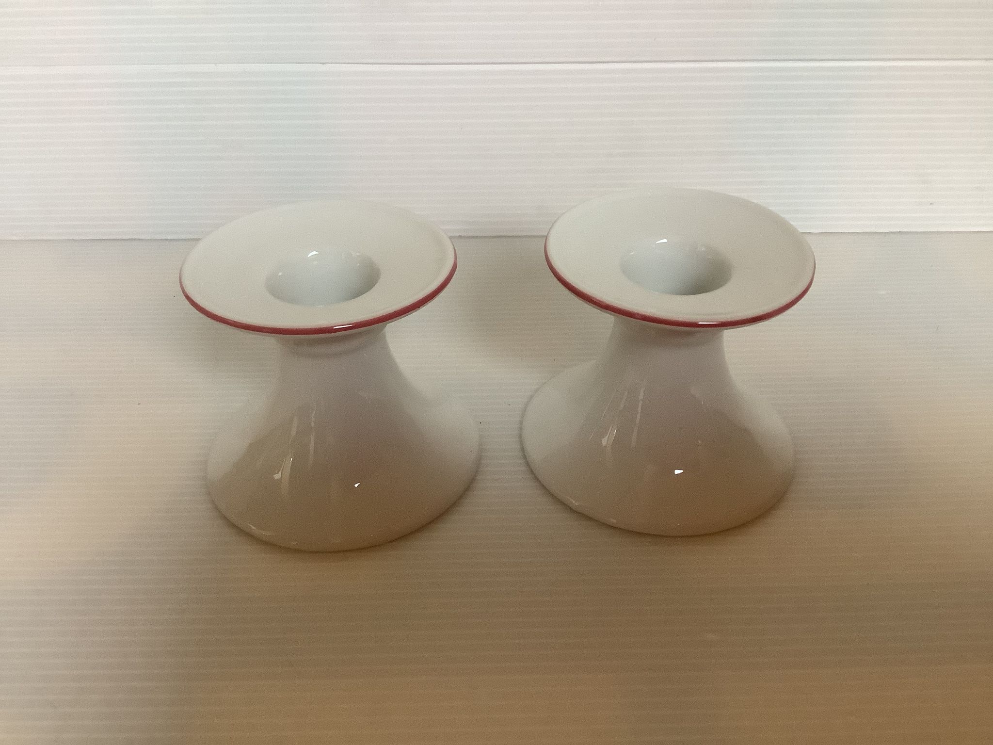 Pair of white candlesticks, pink line, Germany
