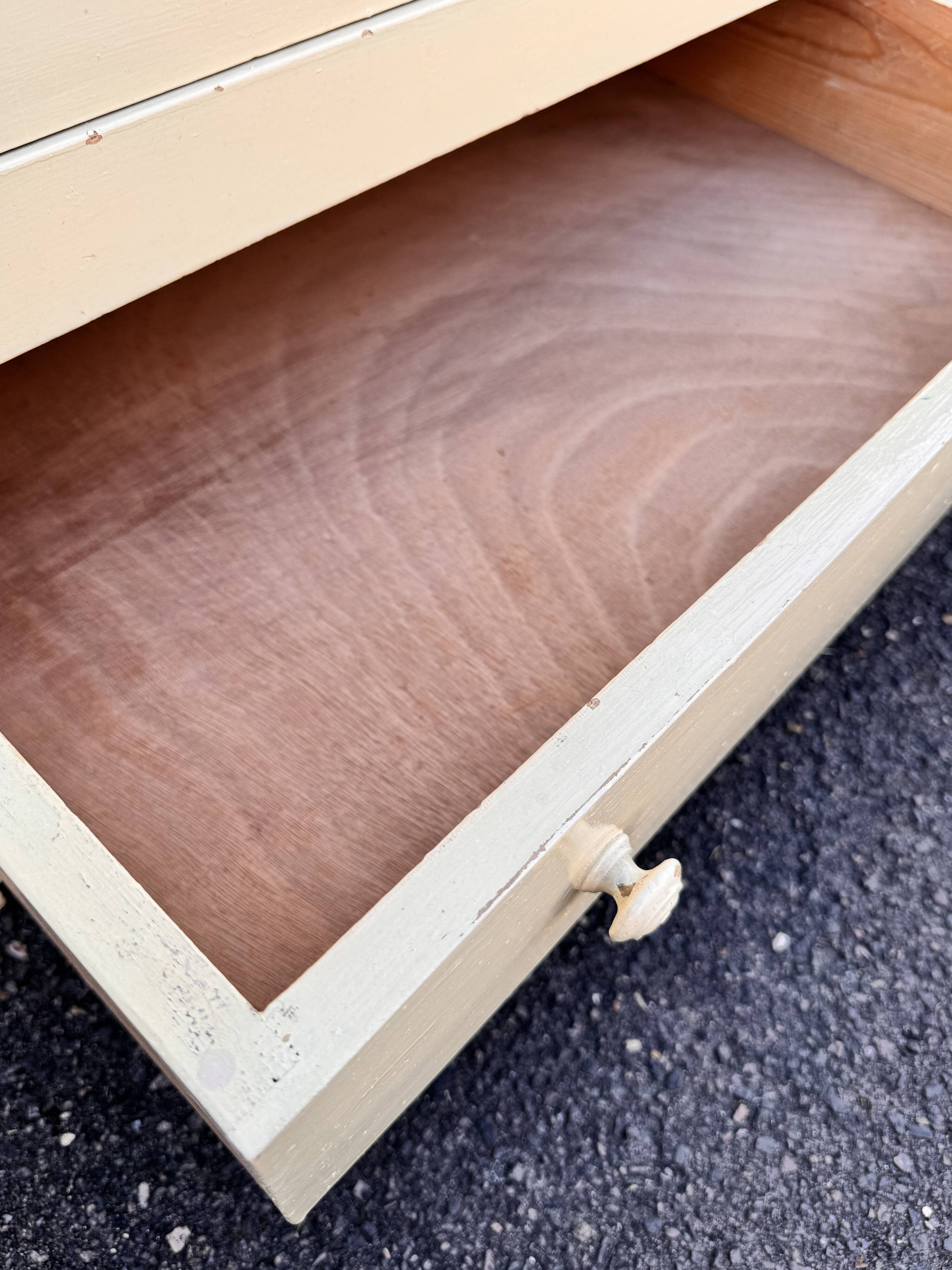 Antique painted wooden bonnet maker