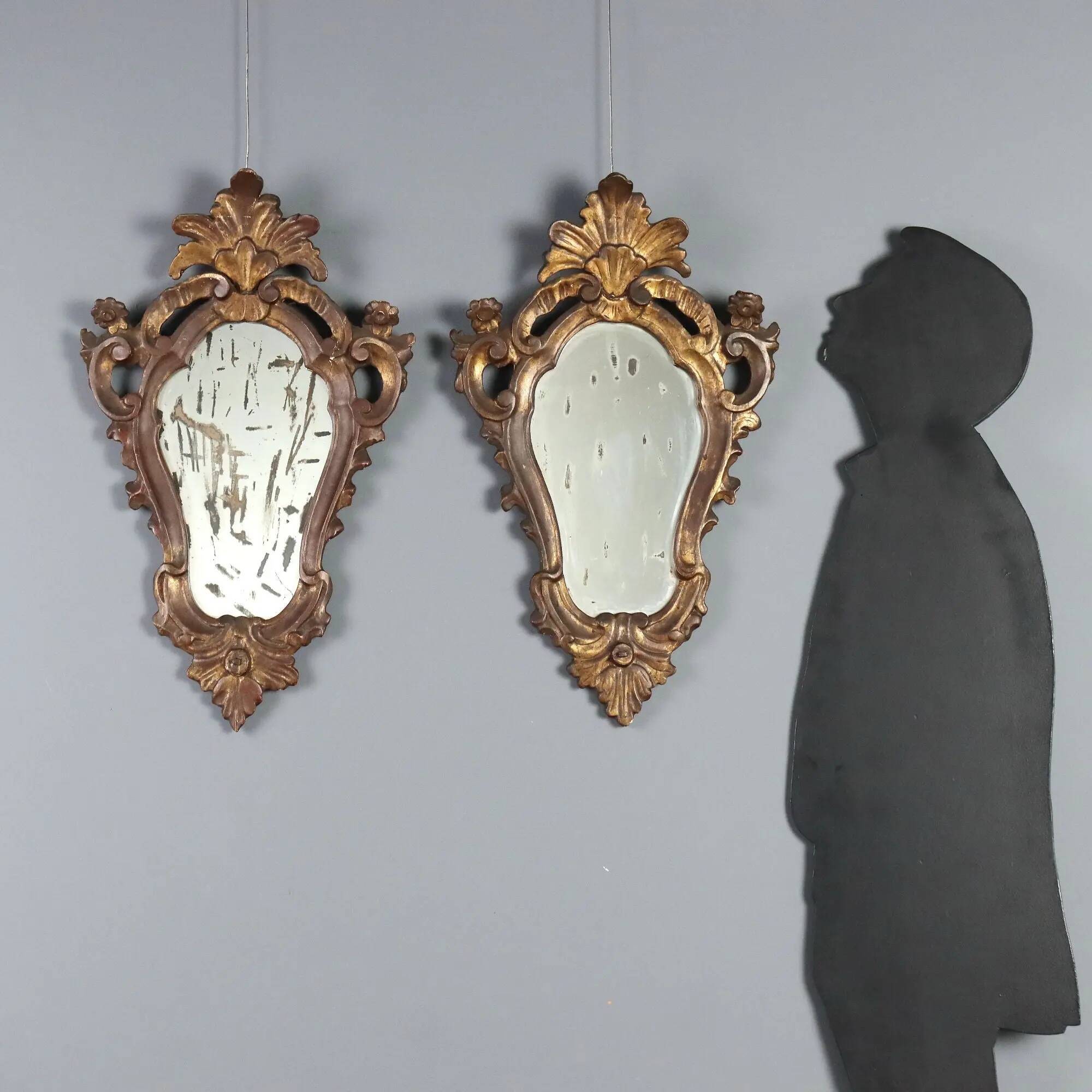 Small antique mirrors in carved and gilded wood, Italy, 20th century.