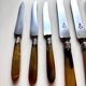 18 Wiskemann table knives in horn