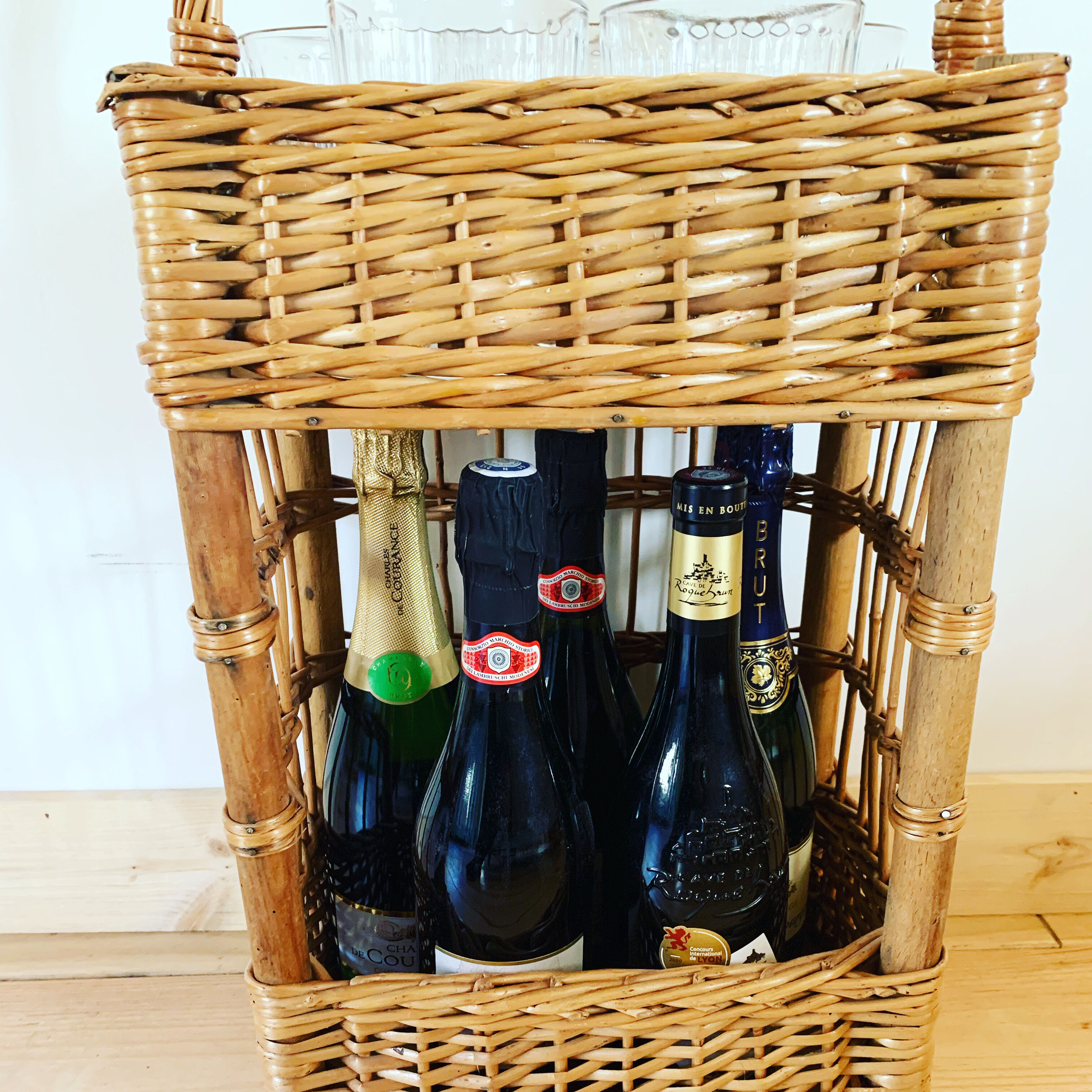 Vintage wicker bottle bar