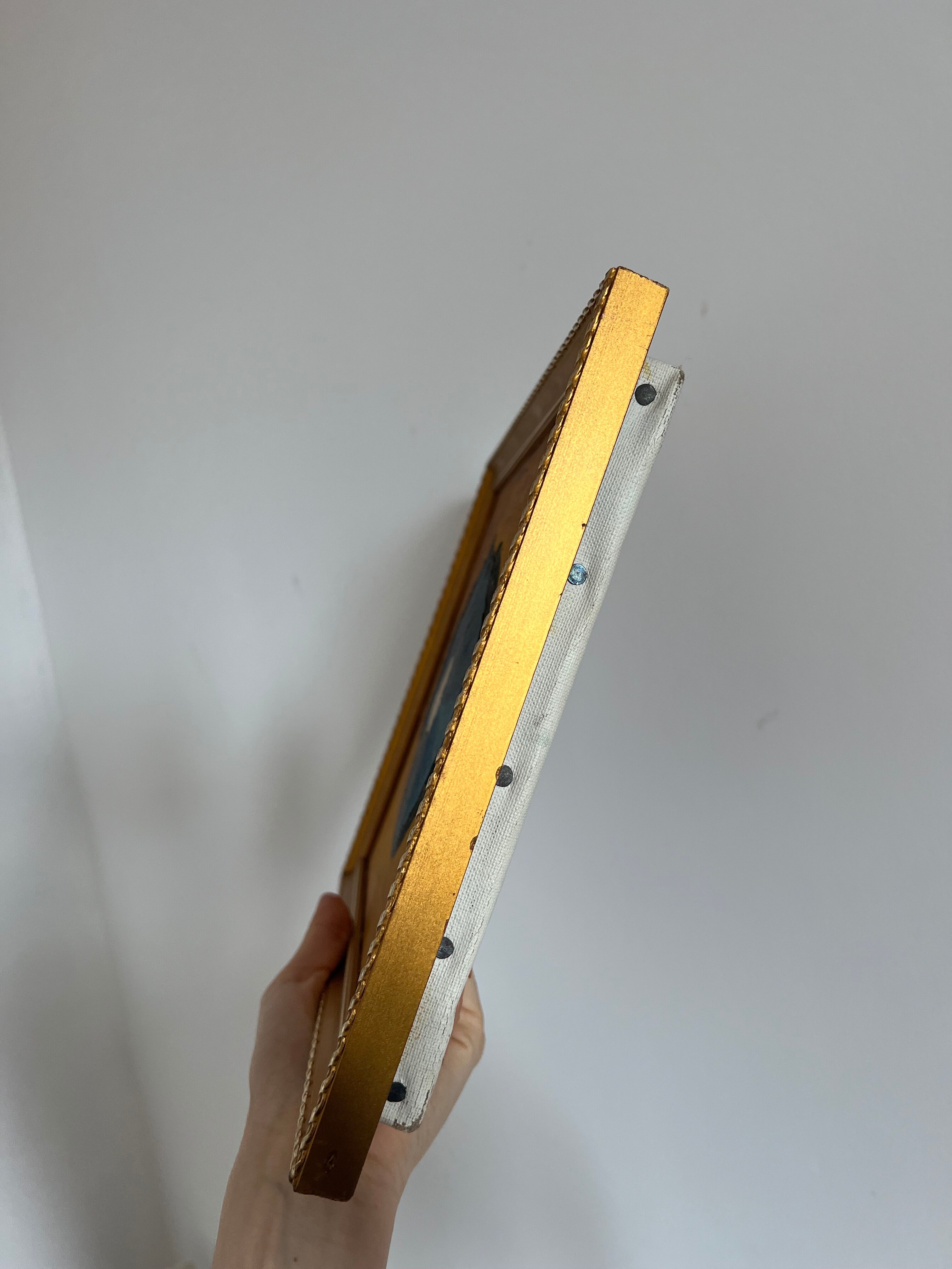 Abstract painting with vintage gilded frame