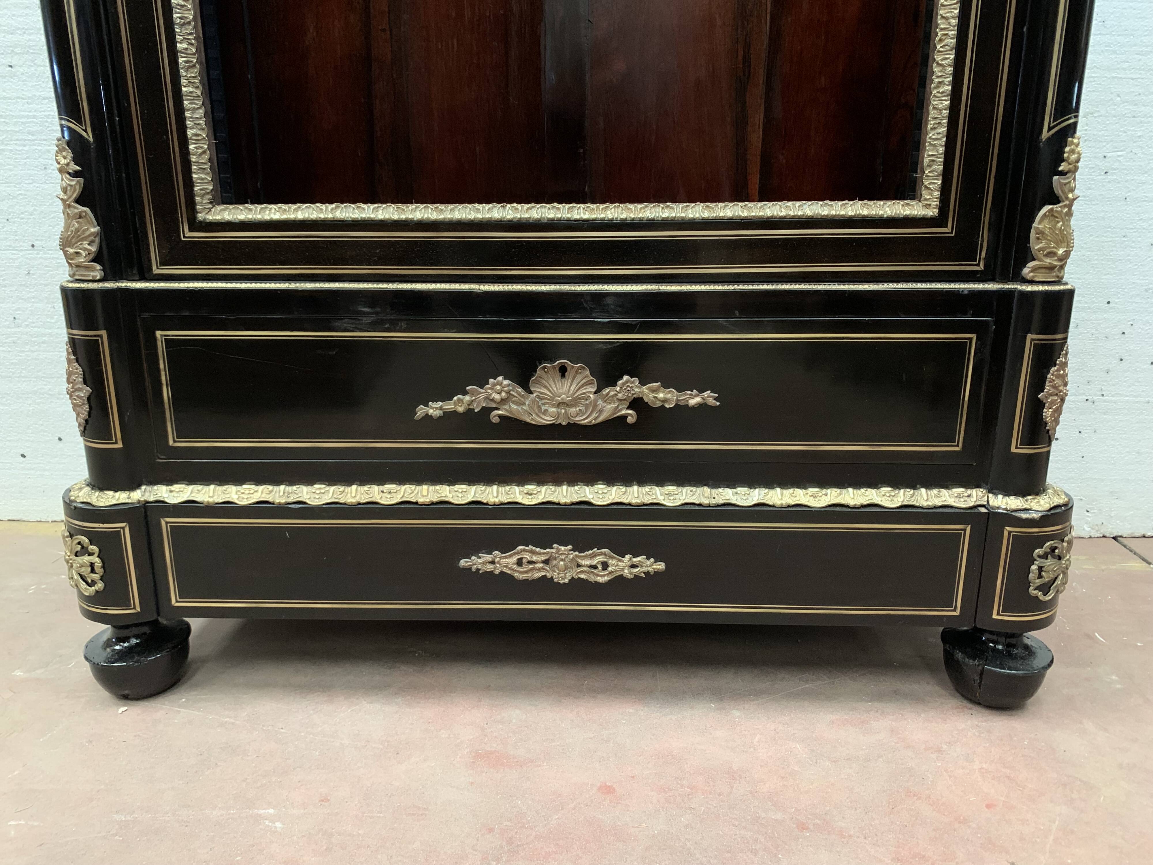 Napoleon III ceremonial showcase in black wood and gilded chiseled bronze XIX century