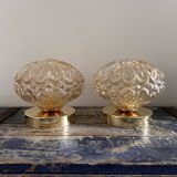 Set of two vintage amber glass wall lights