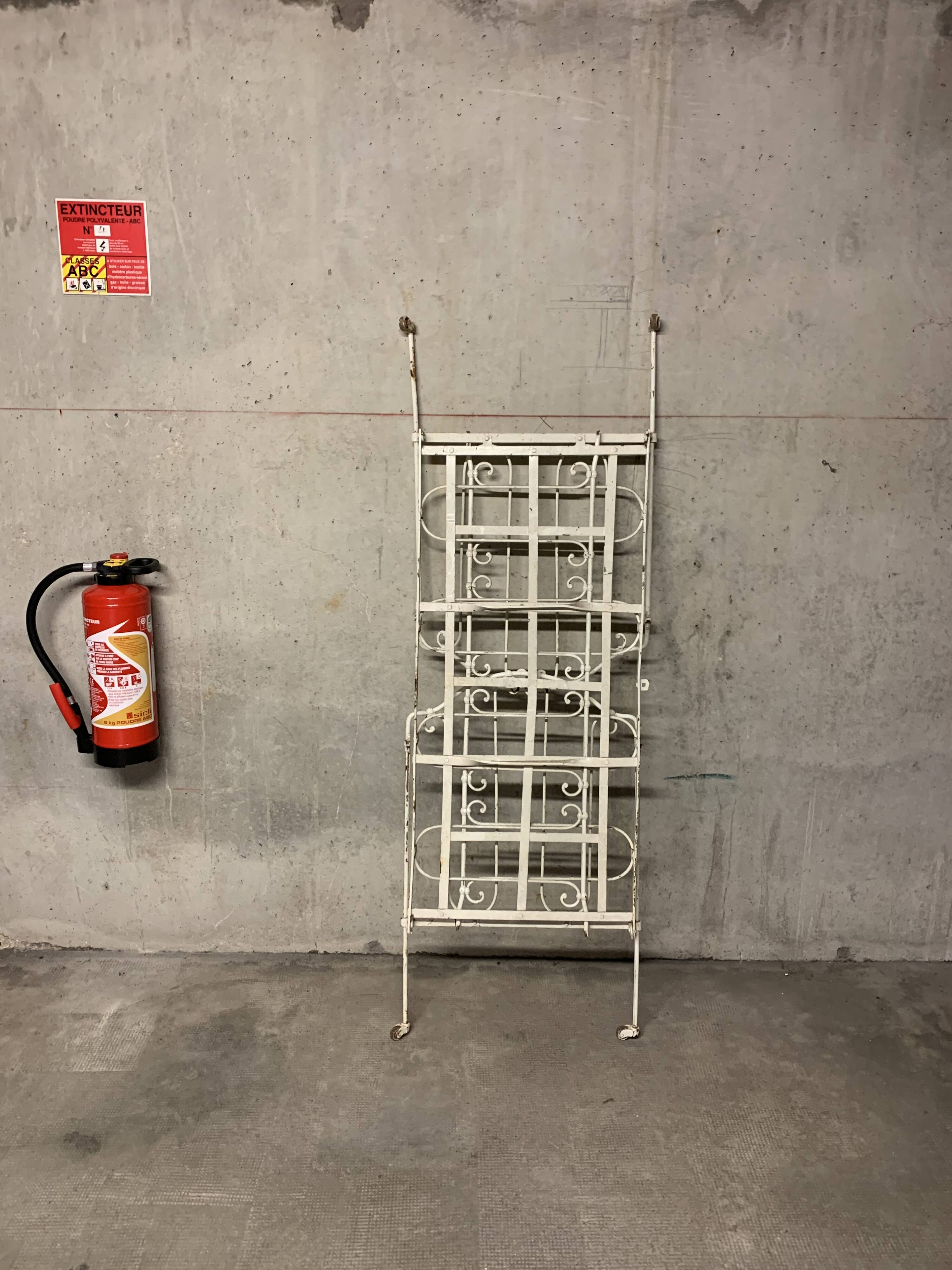 Old vintage wrought iron bench bed