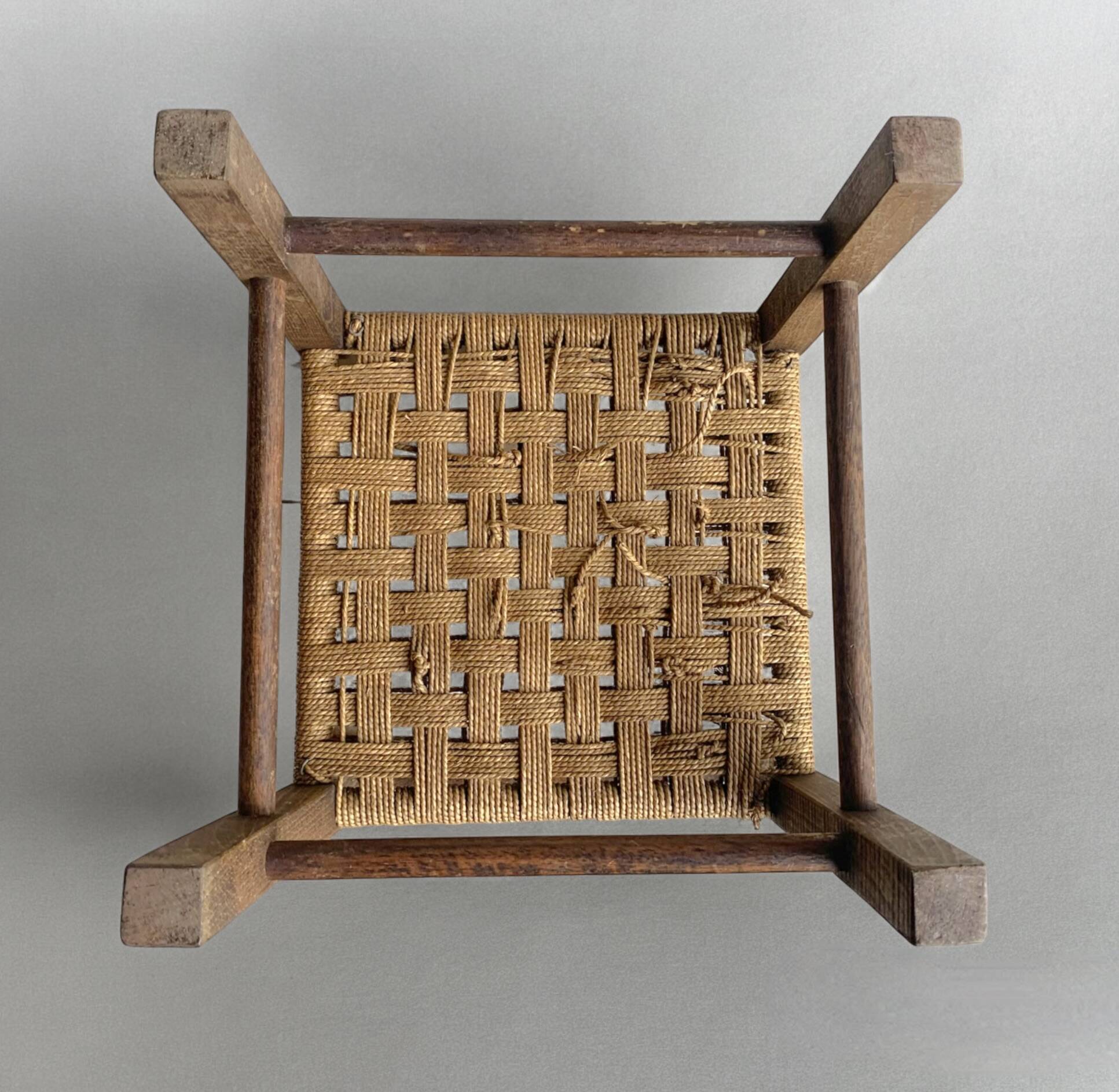 Vintage children's chair made of rope and wood