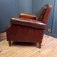 Club armchair in sheepskin in Art Deco style
