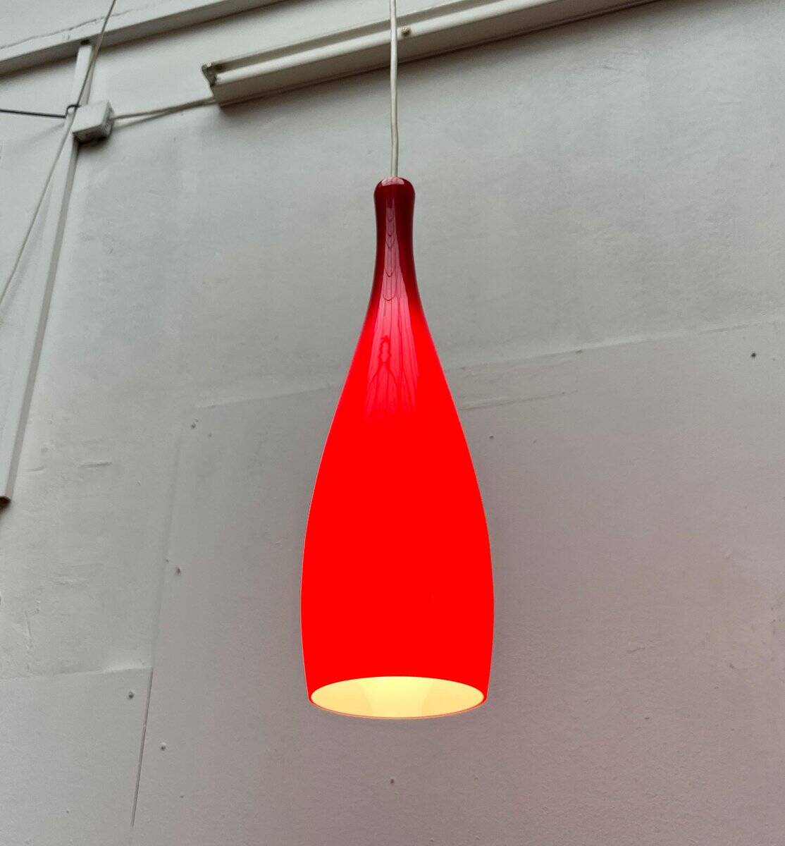 Glass pendant lamp of the mid-century Danish model by Jacob E. Bang for Fog & Mørup and Holmegaard, 1960s.