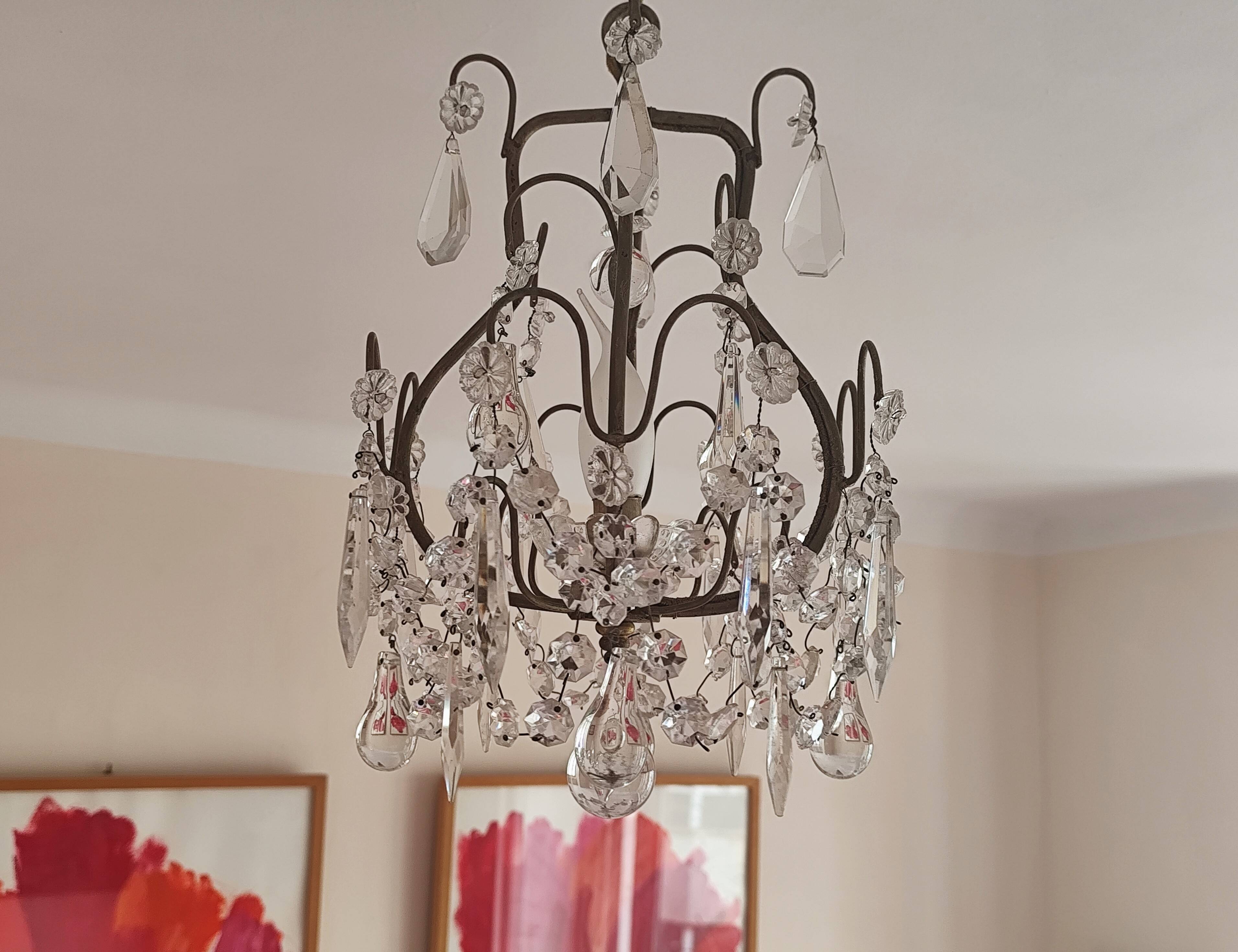 brass cage chandelier with crystal tassels