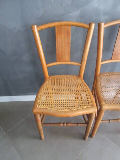 Pair of old caned chairs in blond wood