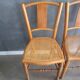 Pair of old caned chairs in blond wood