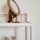 Vintage rattan and bamboo shelves painted white