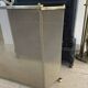 Vintage English fire screen in brass and gilded metal.