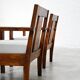 Pair of French modernist teak armchairs, 1960s