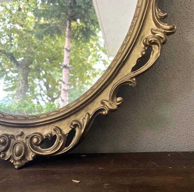 Oval mirror in Baroque style