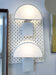 Pair of "Olympe" wall lights by Guzzini, 1970