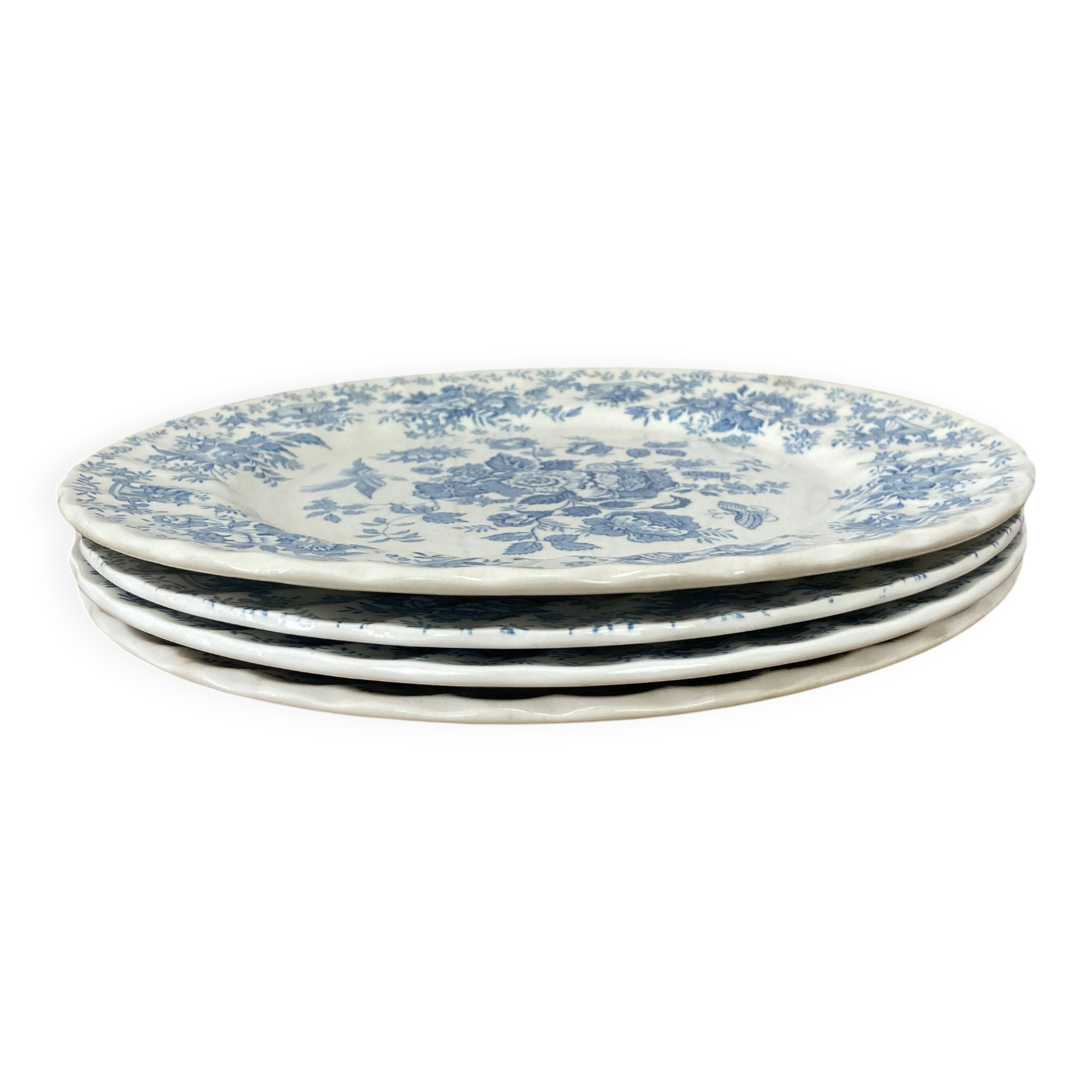 Four old blue plates