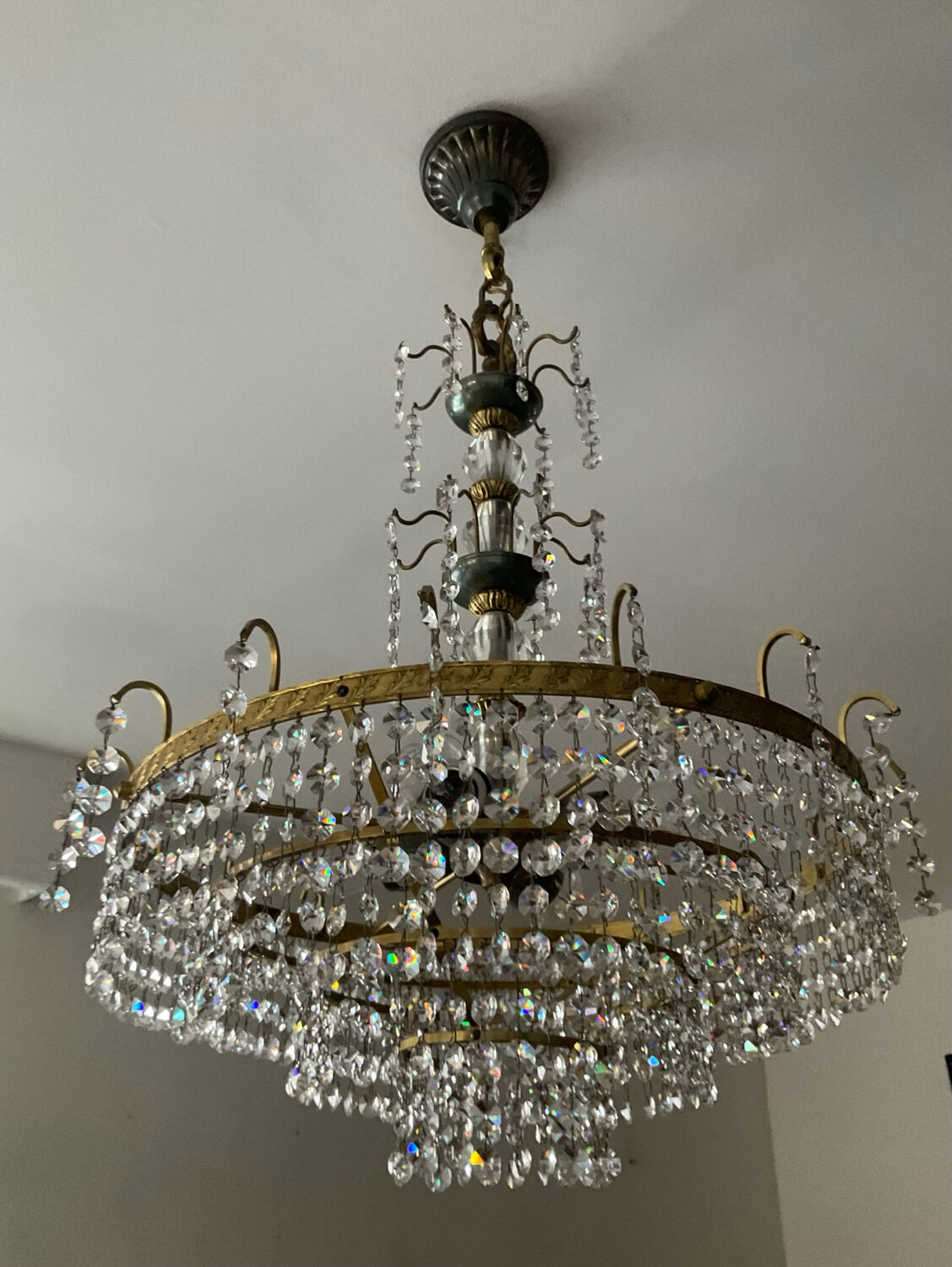 Brass chandelier with crystal pendants