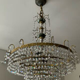 Brass chandelier with crystal pendants