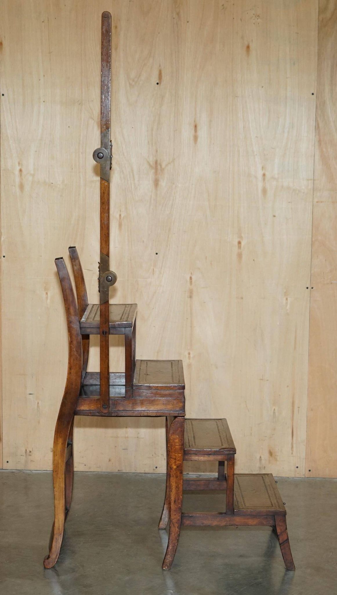 Victorian library chair, convertible, hardwood, leather, brass, circa 1880.