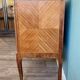 Small Louis XV-style chest of drawers  in veneer and bronze