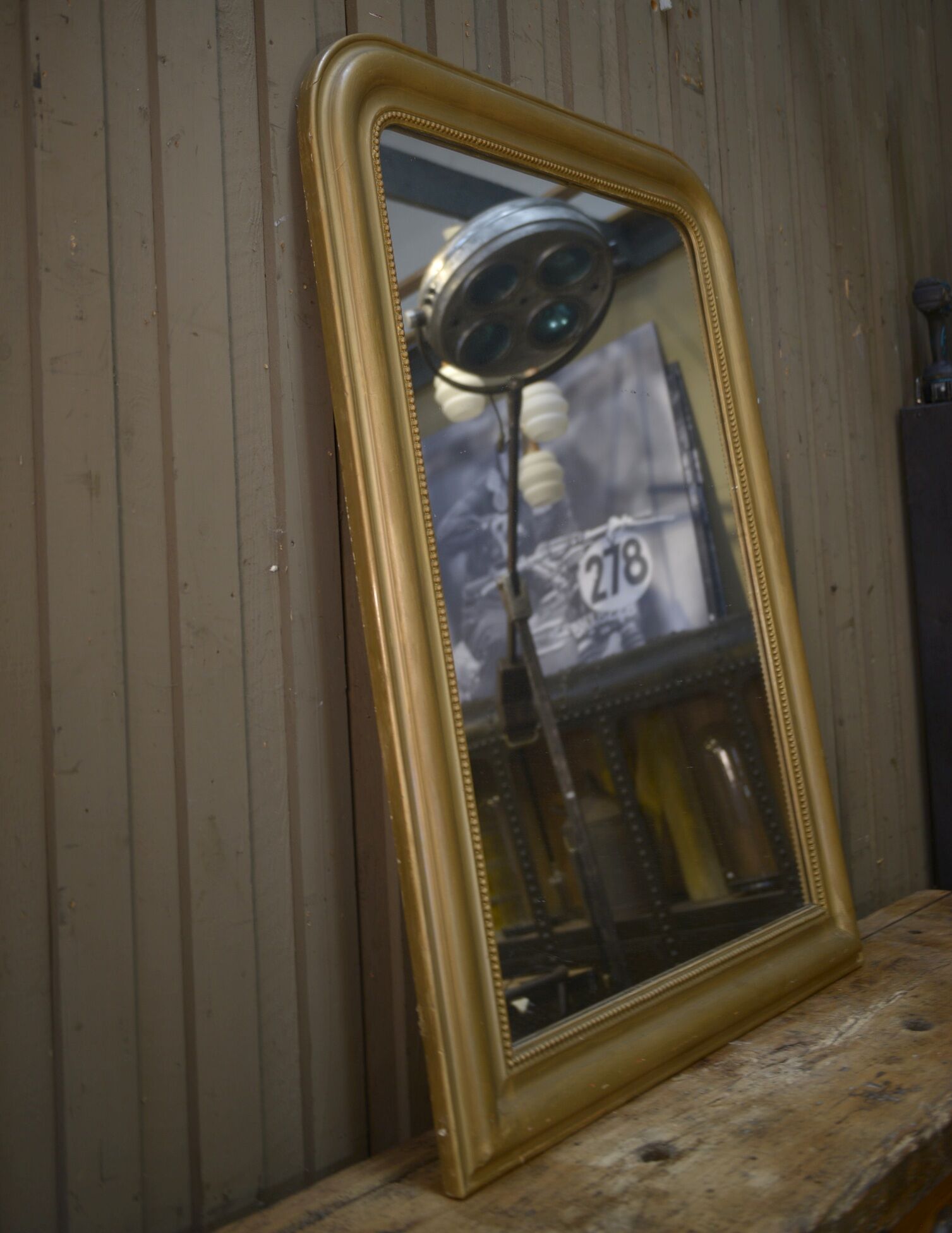 Old mirror in gilded wood 19th