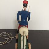 Soldier on wooden horse to shoot