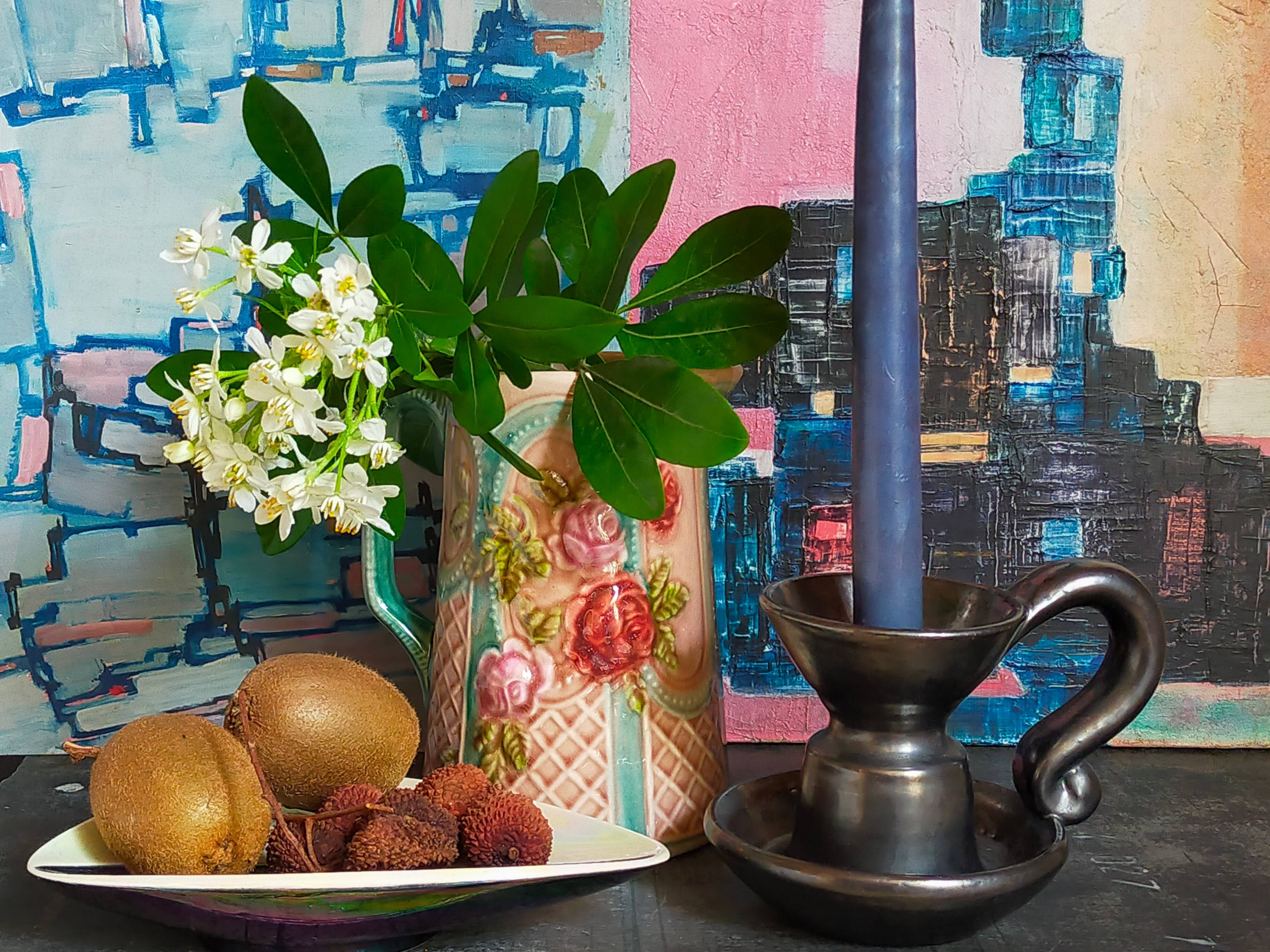 1950s iridescent black ceramic hand candle holder