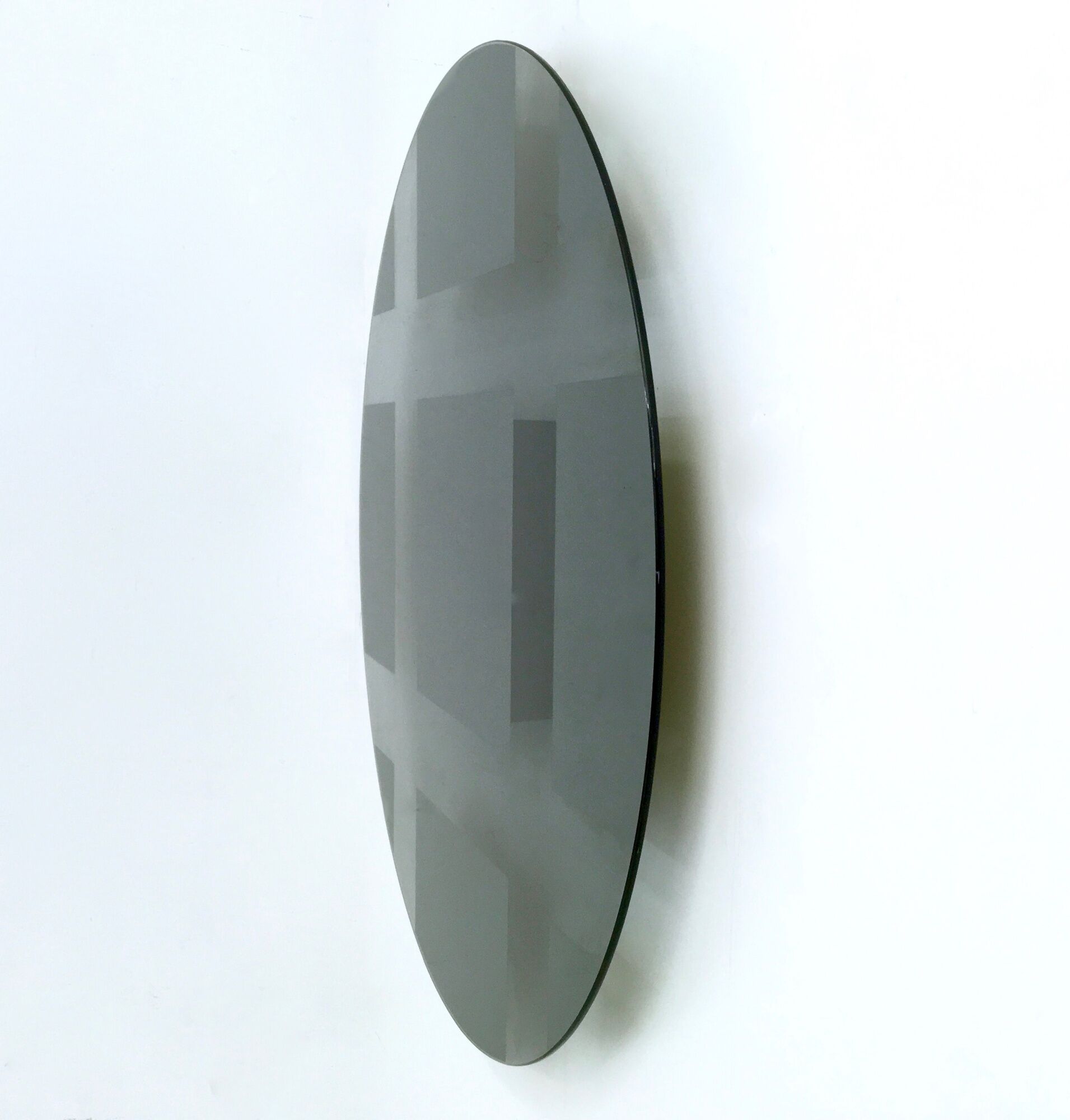 Postmodern round green-gray wall mirror "Andromeda" by Nanda Vigo, Italy 1976