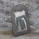 Oriental mirror in chiseled metal – beveled, for placing on a surface or hanging