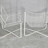 Paire de fauteuils tiges d'acier laqués blanc. Circa 1985