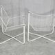 Paire de fauteuils tiges d'acier laqués blanc. Circa 1985