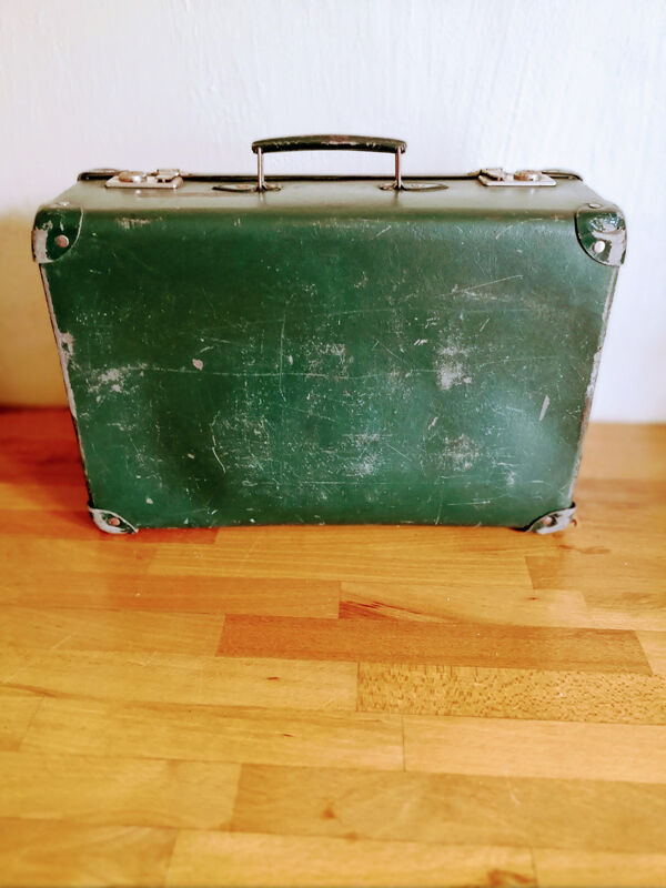 Small green suitcase