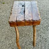 Solid wood stool in brutalist style