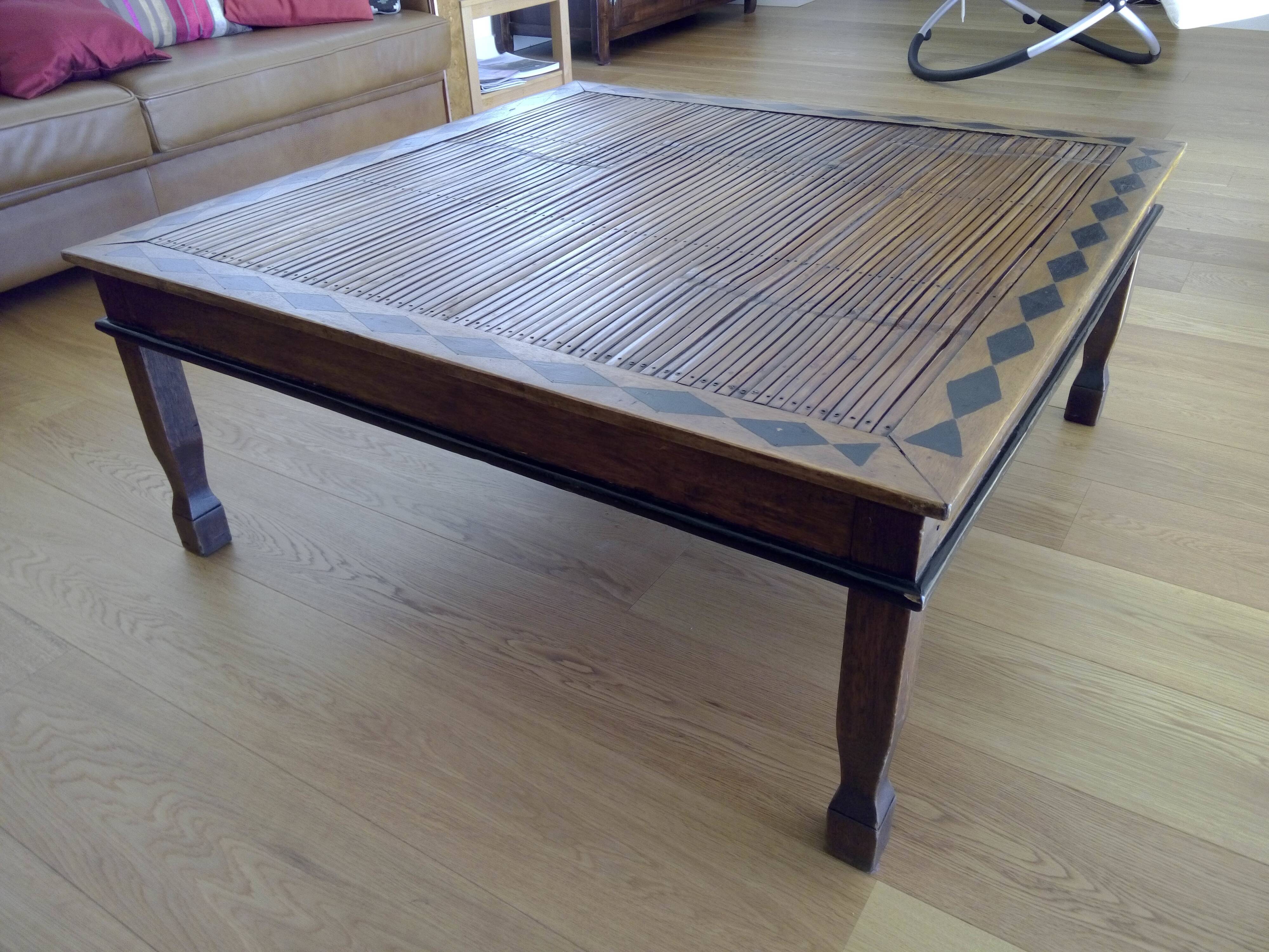Coffee table made of exotic wood and bamboo.