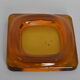 Empty amber glass pocket