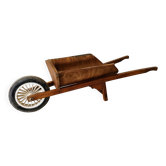 Old wooden toy wheelbarrow for children