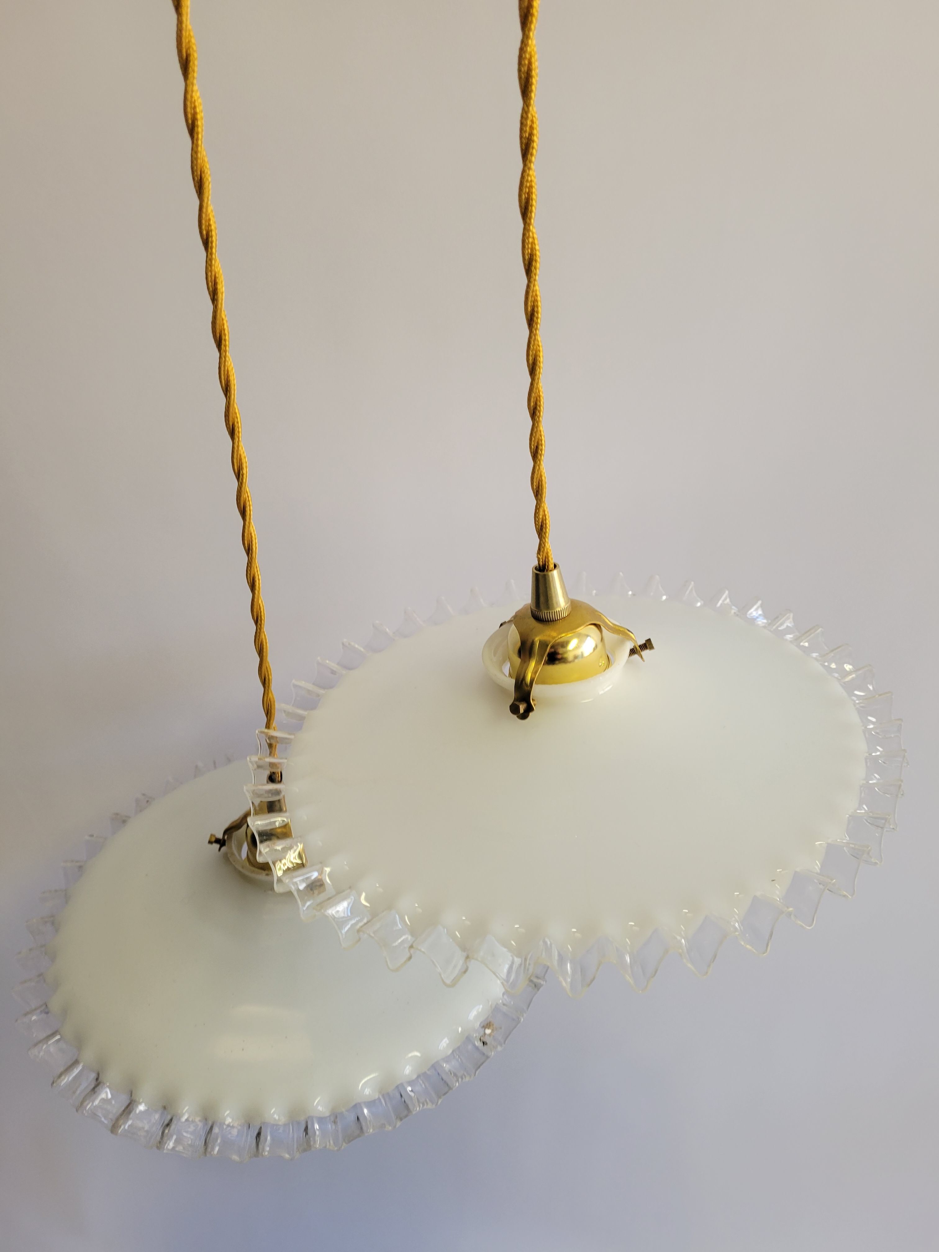 Duo of serrated opaline suspensions