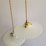 Duo of serrated opaline suspensions