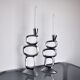 Pair of circle candlesticks by matthew hilton, england, 1980