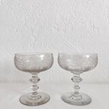 2 antique champagne glasses in engraved glass
